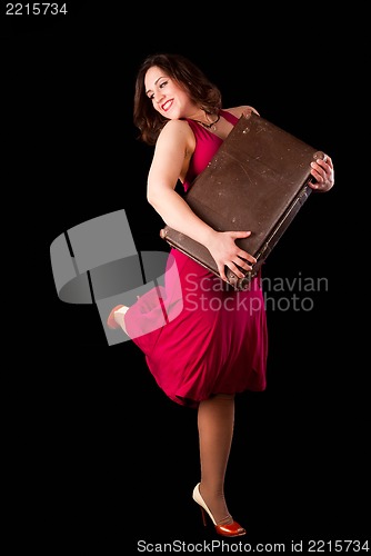 Image of Pretty woman with suitcase