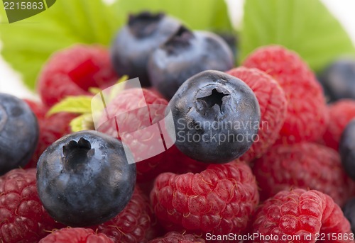 Image of Many blueberries & raspberries.