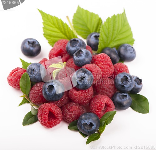 Image of Many blueberries & raspberries.