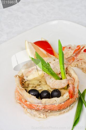 Image of fish with rice and vegetables