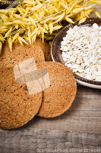 Image of Oatmeal cookies and cereal on the kitchen table
