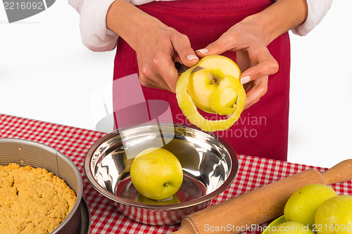 Image of Peeling apples