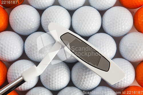 Image of Golf putter and balls