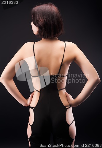 Image of Beautiful woman in sexy overalls