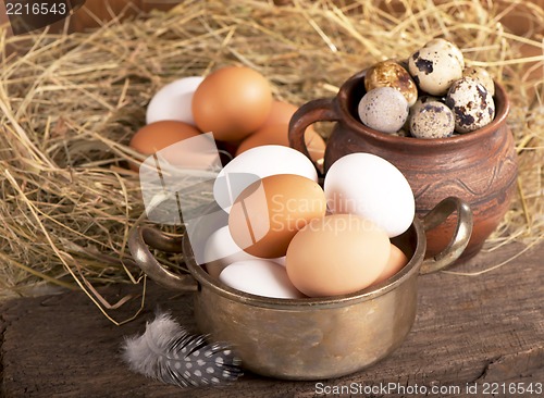 Image of eggs on old wooden background