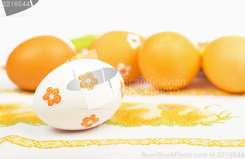 Image of Easter eggs on the embroidered cloth