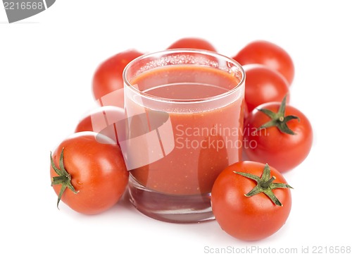 Image of Glass of tomato juice and tomatoes