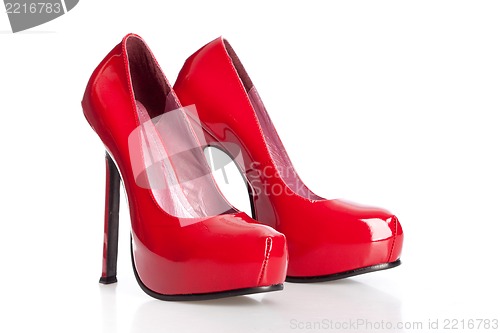 Image of red court shoes