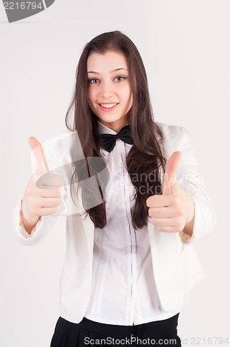 Image of Attractive woman with thumb up