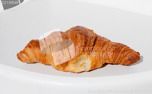 Image of Fresh and tasty croissant on white