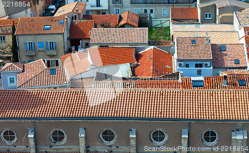 Image of Top view on red tiled roofs