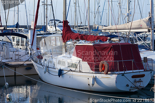 Image of Yachts moored in a marina