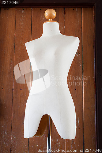 Image of Sepia clothing mannequin display on  vintage background