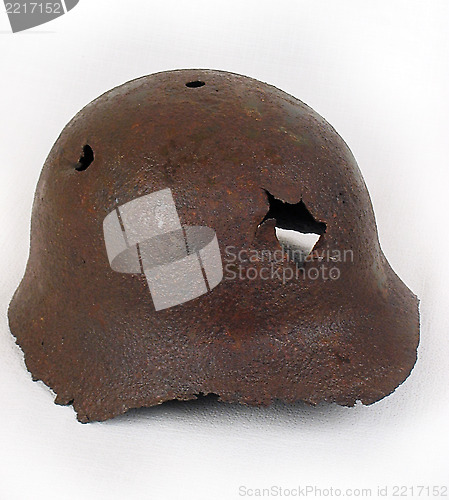 Image of Rusty helmet 