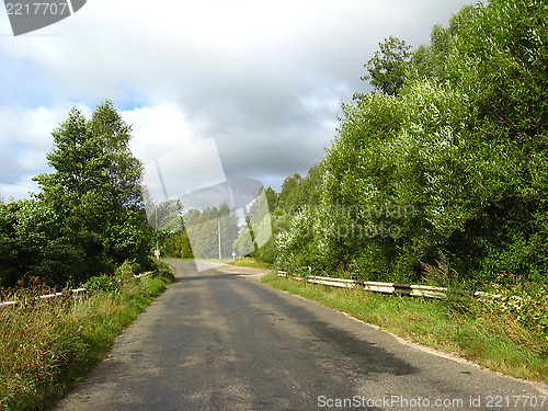 Image of asphalted road and dark blue sky