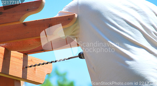 Image of Patio construction worker.