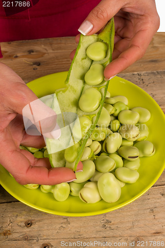 Image of Peeling beans