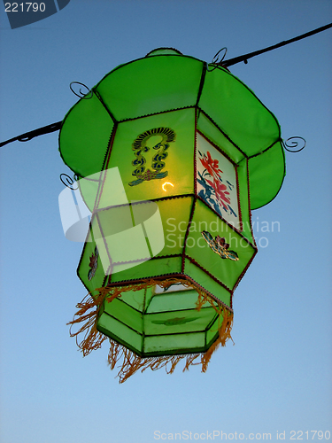 Image of Cozy light of a green Chinese lantern