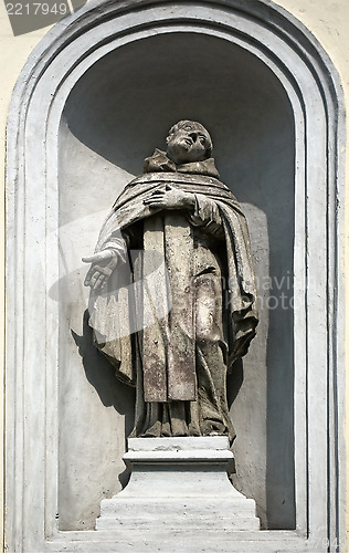 Image of statue of a priest