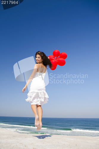 Image of Jumping with red ballons