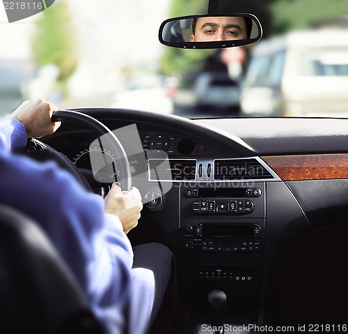 Image of rear-view mirror and dashboard