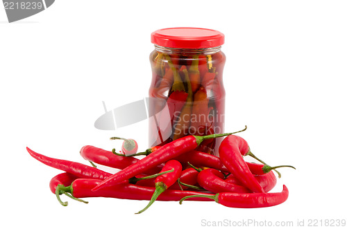 Image of red hot chilli pepper paprika marinated fresh pot 