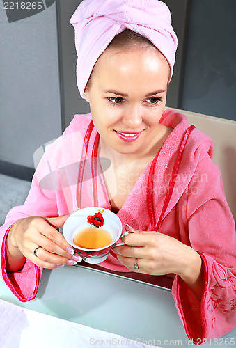 Image of woman drinks tea