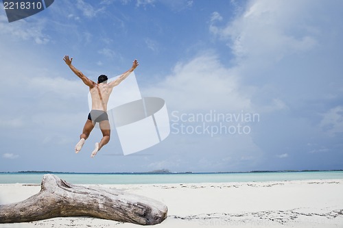 Image of Man enjoying on the beach