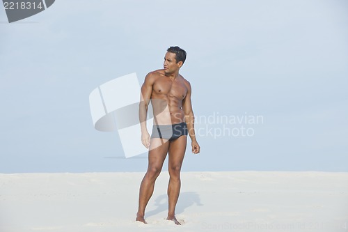 Image of Man standing on the beach