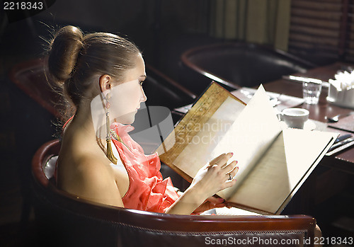 Image of woman at restaurant