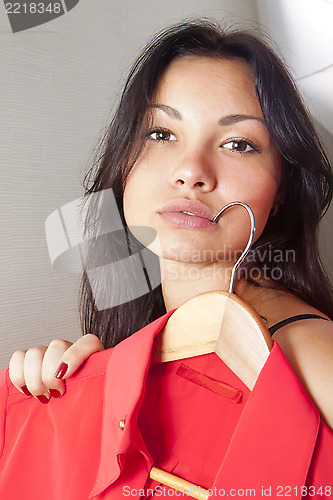 Image of close up of girl which tries on shirt