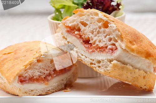 Image of ciabatta panini sandwich with parma ham and tomato