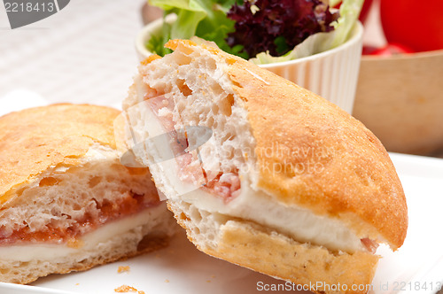 Image of ciabatta panini sandwich with parma ham and tomato