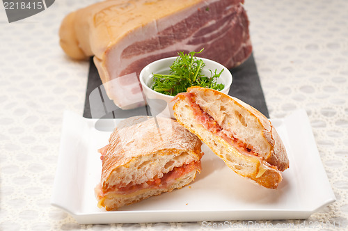 Image of ciabatta panini sandwich with parma ham and tomato