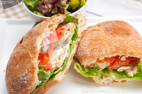 Image of ciabatta panini sandwich with chicken and tomato