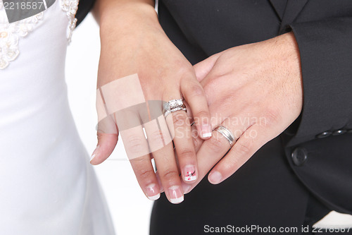 Image of Married Couple With Wedding Rings and Bands