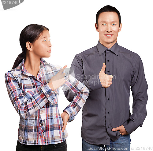Image of Asian Man and Girl Showing Well Done