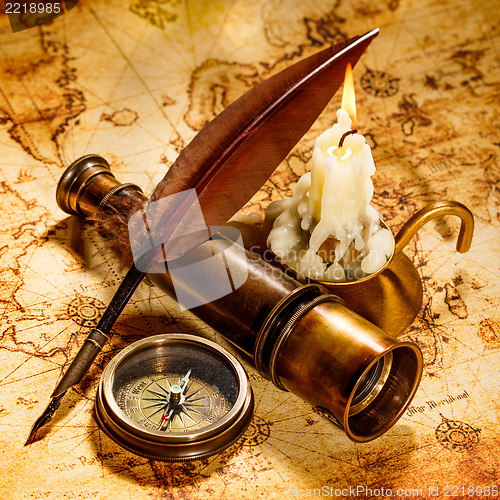 Image of Vintage still life. Vintage items on ancient map.