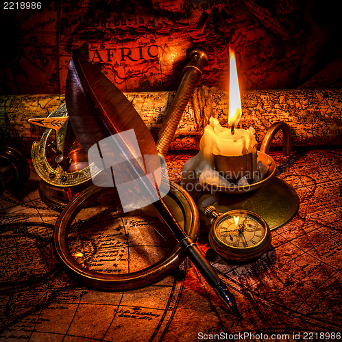 Image of Vintage still life. Vintage items on ancient map.