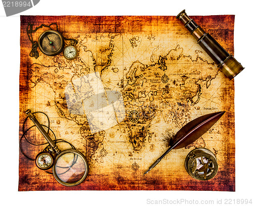 Image of Vintage still life. Ancient world map isolated on white.