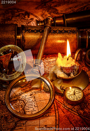 Image of Vintage still life. Vintage items on ancient map.