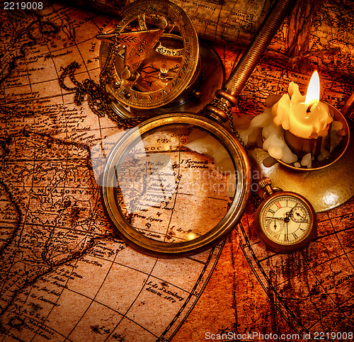 Image of Vintage still life. Vintage items on ancient map.