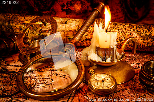 Image of Vintage still life. Vintage items on ancient map.