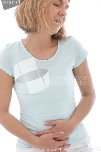 Image of Woman holding her stomach in pain