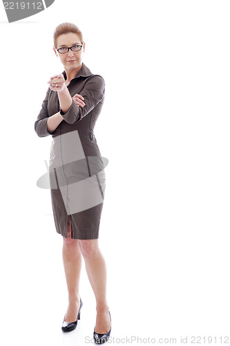 Image of Mature businesswoman pointing at the viewer