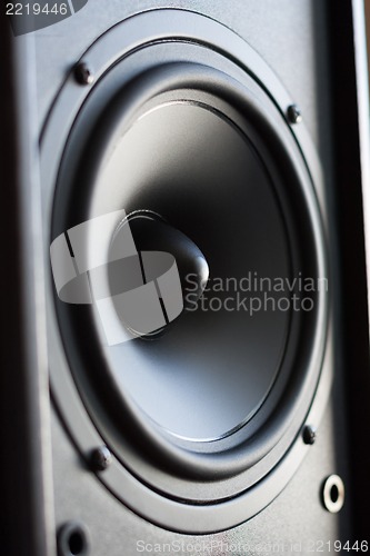 Image of Powerful audio system. Closeup view of black bass power speaker