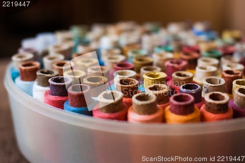 Image of Colorful reels of threads background - A series of TAILOR related images.