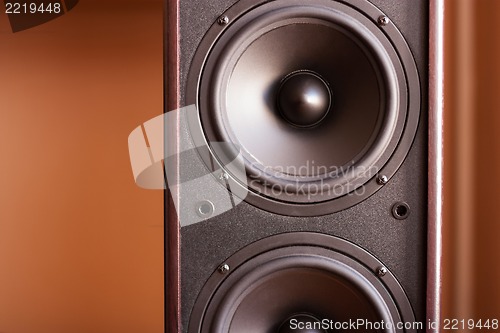 Image of Powerful audio system. Closeup view of black bass power speaker
