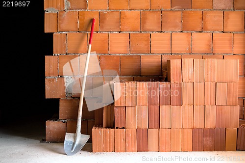 Image of Masonry Shovel bucket and bricks