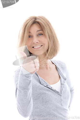 Image of Happy casual woman giving a thumbs up